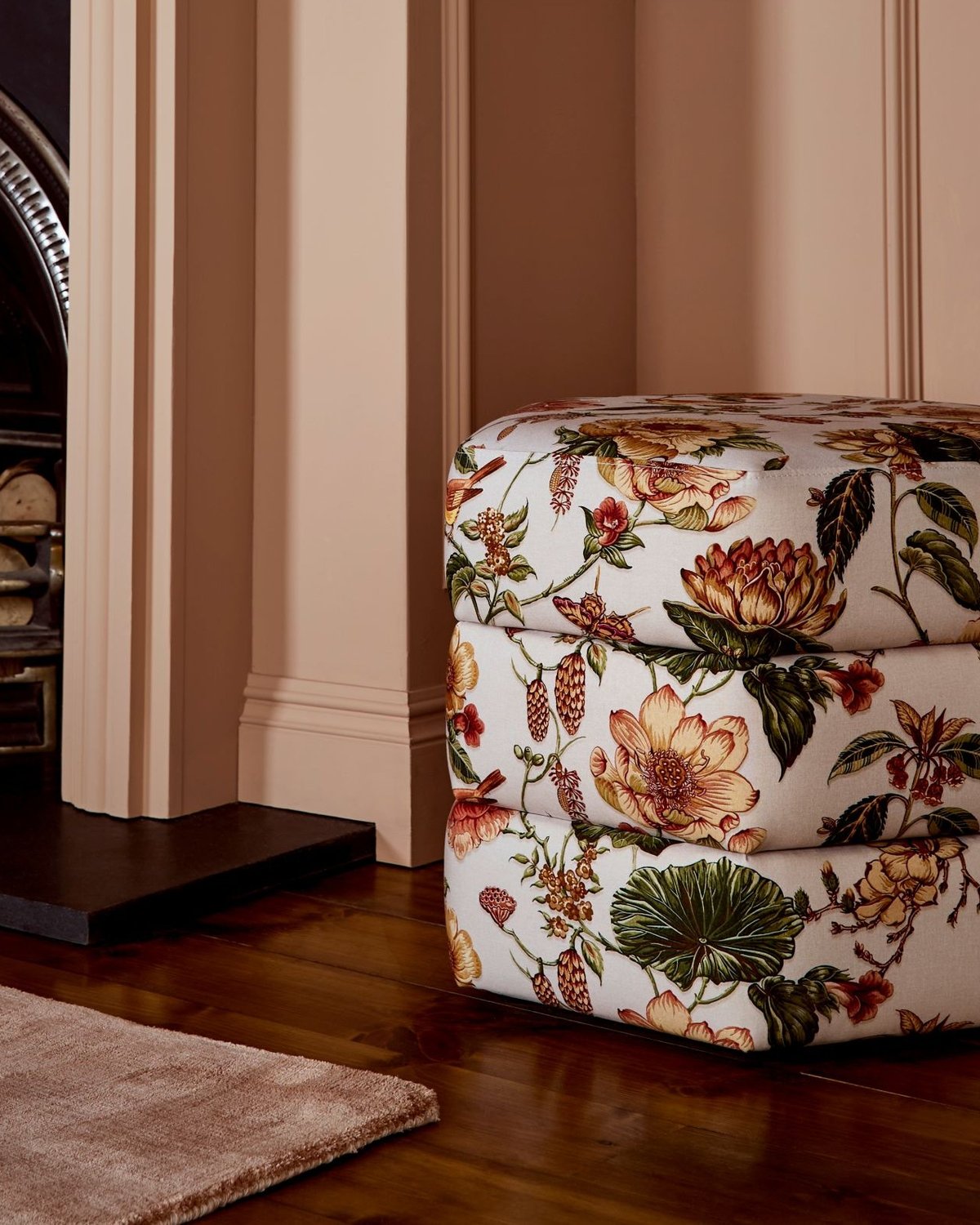 Roselle Grove Pouffe featured with Rose Earth interior eggshell painted fire surround