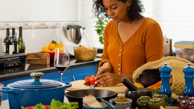 Woman cutting tomatoes