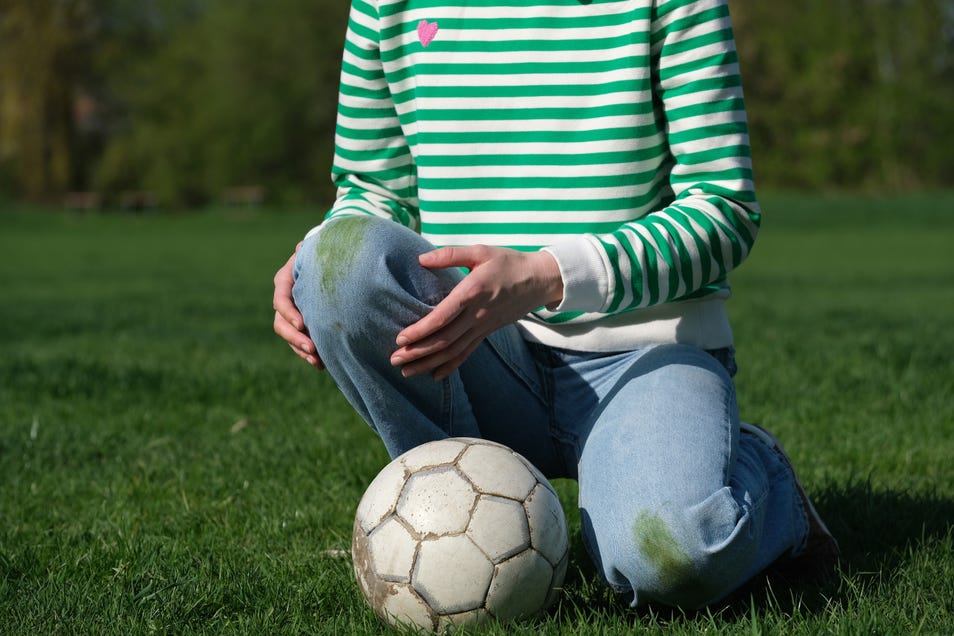 Tackling grass stains from sports uniforms