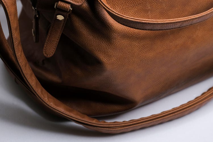 Cleaning grease marks from leather shoes