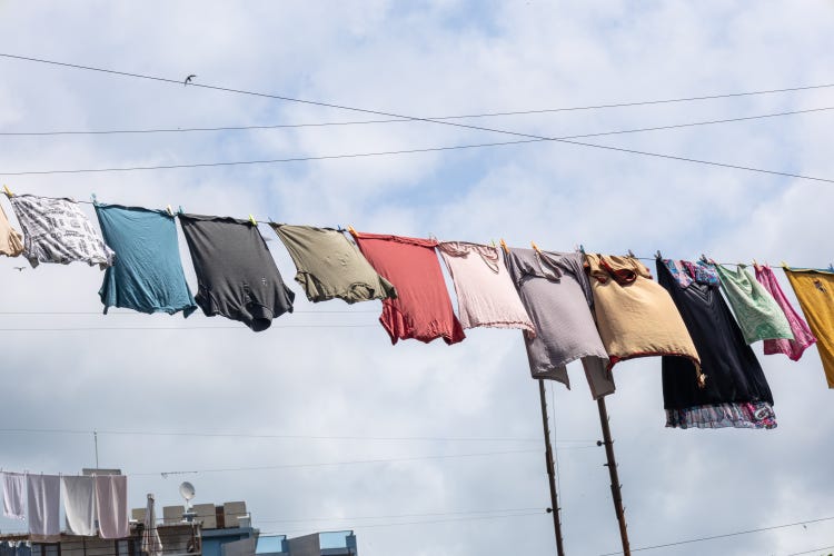 Cleaning Clothes With Warm Water