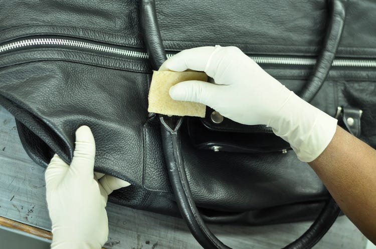 how to clean leather bag stain