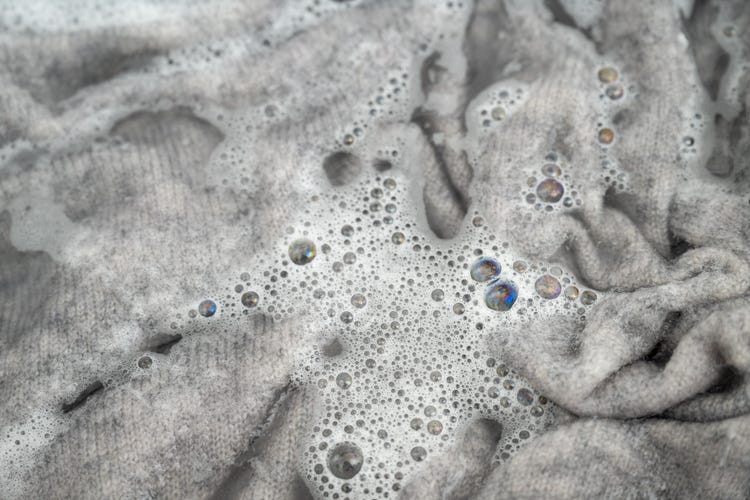 Oil stain removal for wool fabric