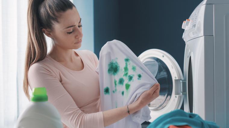 Paint stained clothes in a washing machine
