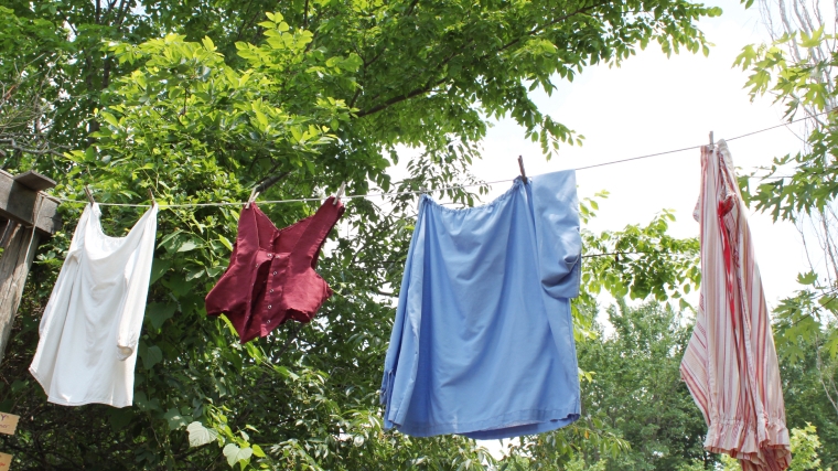Silk clothing items hanging on a clothes hanger