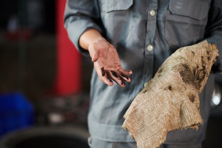 how to remove car oil from clothes