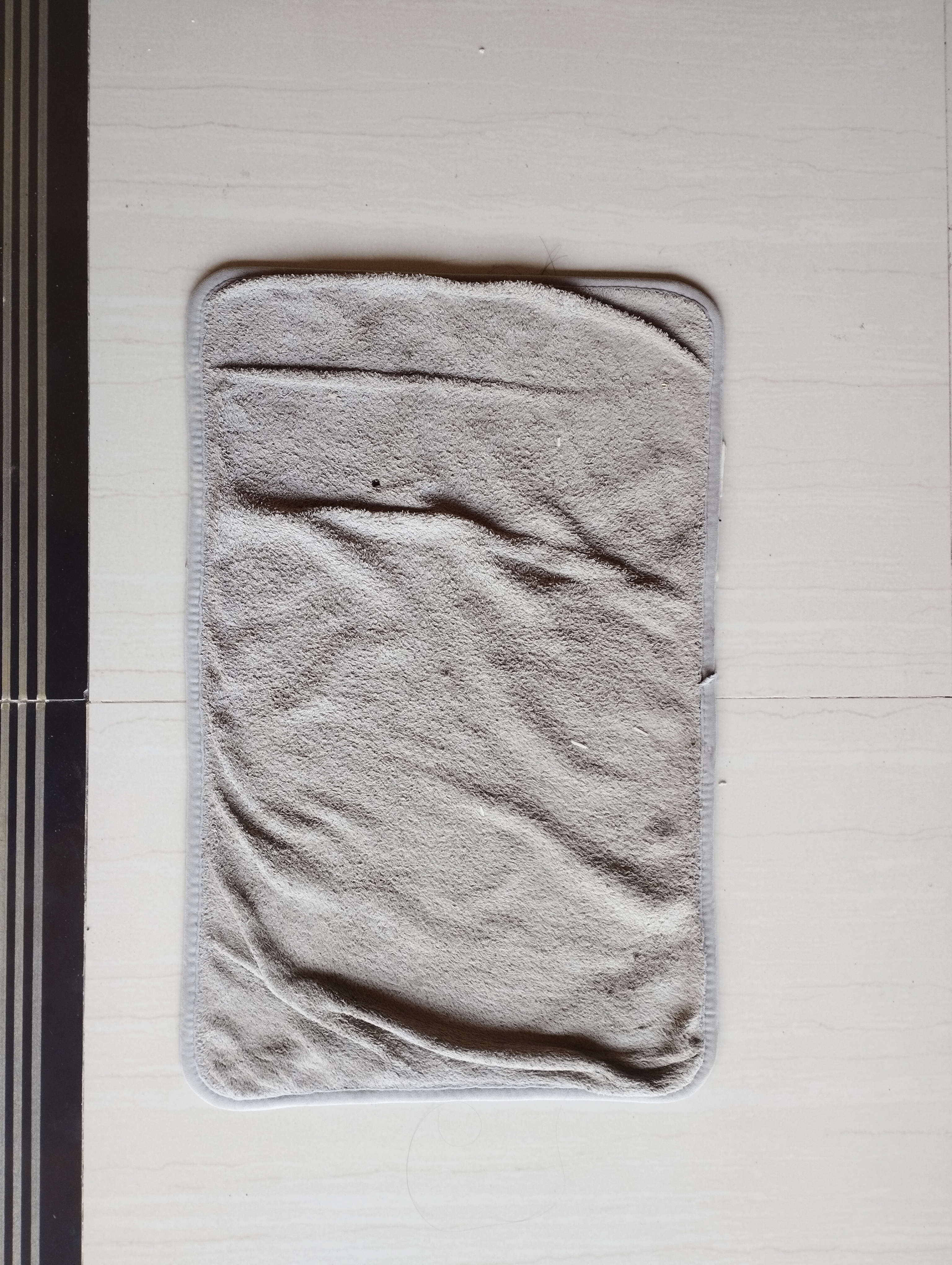 How to clean and maintain bath mats