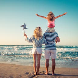 161275_AdobeStock_157157855_Happy-family-having-fun-on-summer-vacation.jpg