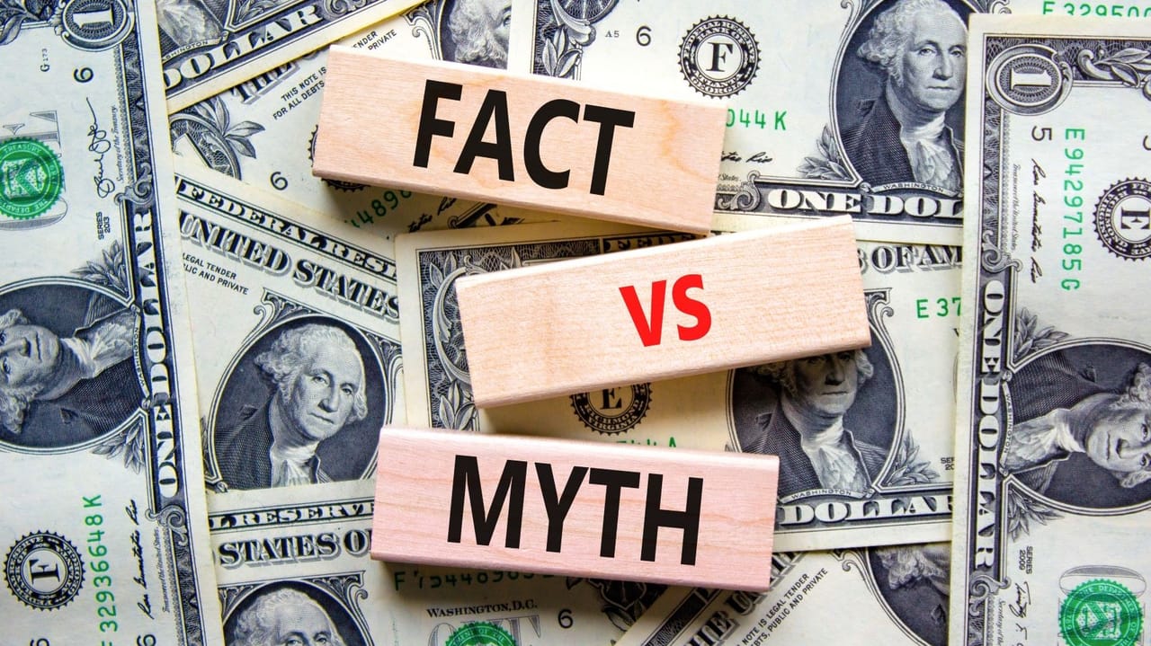 An image of block tiles with the words myth and fact on top of dollar bills An image of block tiles with the words myth and fact on top of dollar bills