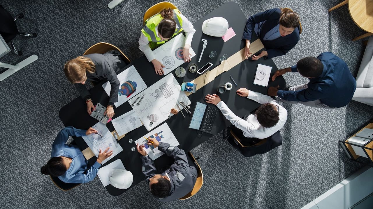 An image from the top of a team of employees An image from the top of a team of employees