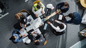 An image from the top of a team of employees An image from the top of a team of employees