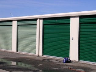 Properly restored self-storage doors making an amazing improvement to a facility's curb appeal.