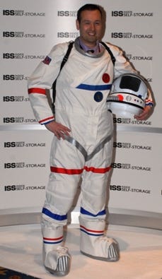 Robert Madsen in his space suit, drawing attention to his quest to be nominated for the Axe Apollo Space Academy Space Camp.