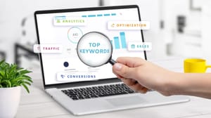 A laptop screen with keyword statistics, surrounded by icons for analytics, traffic, conversions, optimization and sales A laptop screen with keyword statistics, surrounded by icons for analytics, traffic, conversions, optimization and sales
