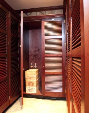 Wine-storage lockers can be constructed of exotic woods for a luxurious appeal. (Photo courtesy of Janus International.)