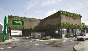 The exterior of a self-storage facility with living plant walls The exterior of a self-storage facility with living plant walls