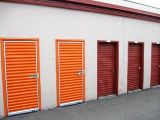 Janus International replaced this facility's existing red doors with shiny new orange ones. Replacing unit doors can give an older facility a fresh look.