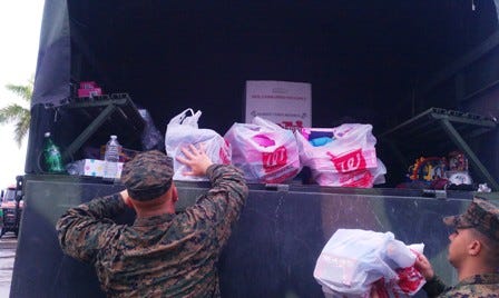 Marines in Florida fill a truck with donations during the annual holiday drive. 