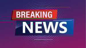 The words breaking news on a video screen. The words breaking news on a video screen.