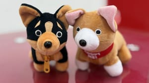 An image of two stuffed animals that are for sale to raise money for the Hong Kong Dog Rescue An image of two stuffed animals that are for sale to raise money for the Hong Kong Dog Rescue