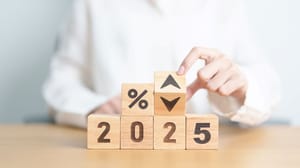 2025 in wood blocks with percentage change to up and down arrow 2025 in wood blocks with percentage change to up and down arrow