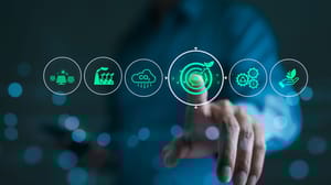 A hand touching several icons related to energy savings A hand touching several icons related to energy savings