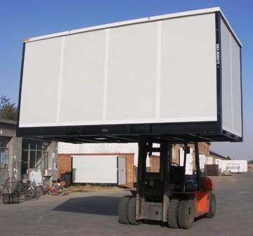 Operators who choose to offer portable-storage delivery and pickup will need additional resources including a forklift. [Photo courtesy of Universal Storage Containers]