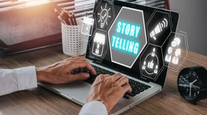 An image of a person's hands on a keyboard with the words storytelling on the computer screen. An image of a person's hands on a keyboard with the words storytelling on the computer screen.
