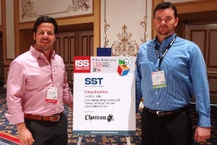 Tony Borysenko (left), vice president of Chateau Products Inc., with J.B. Sills, manager of A Plus Storage in Spring Hill, Tenn., who won the Self-Storage Talk 