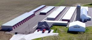 The large units at Big Barn Storage in Evansville, Wis., (left), were feasible regardless of the need for extra-wide drive aisles due to the lower land cost. Because the buildings run east to west, a single-slope “lean-to” style was used to shed water to the south and prevent ice build-up against the doors.