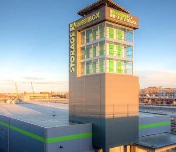 This Greenbox facility in Denver is an extreme example of architectural massing and windows being used to maximize signage and branding opportunities. In this case, a tower element was built to help make a site that was sunk below a major roadway more visible to potential customers. (Courtesy of DCB Construction)