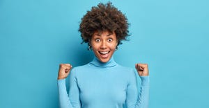 Excited-Woman-Blue-Background.jpg