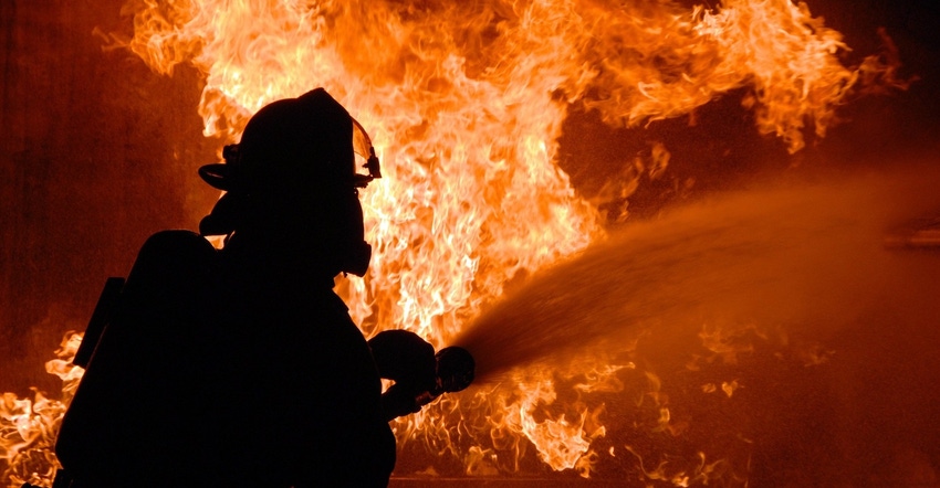firefighter battling a blaze