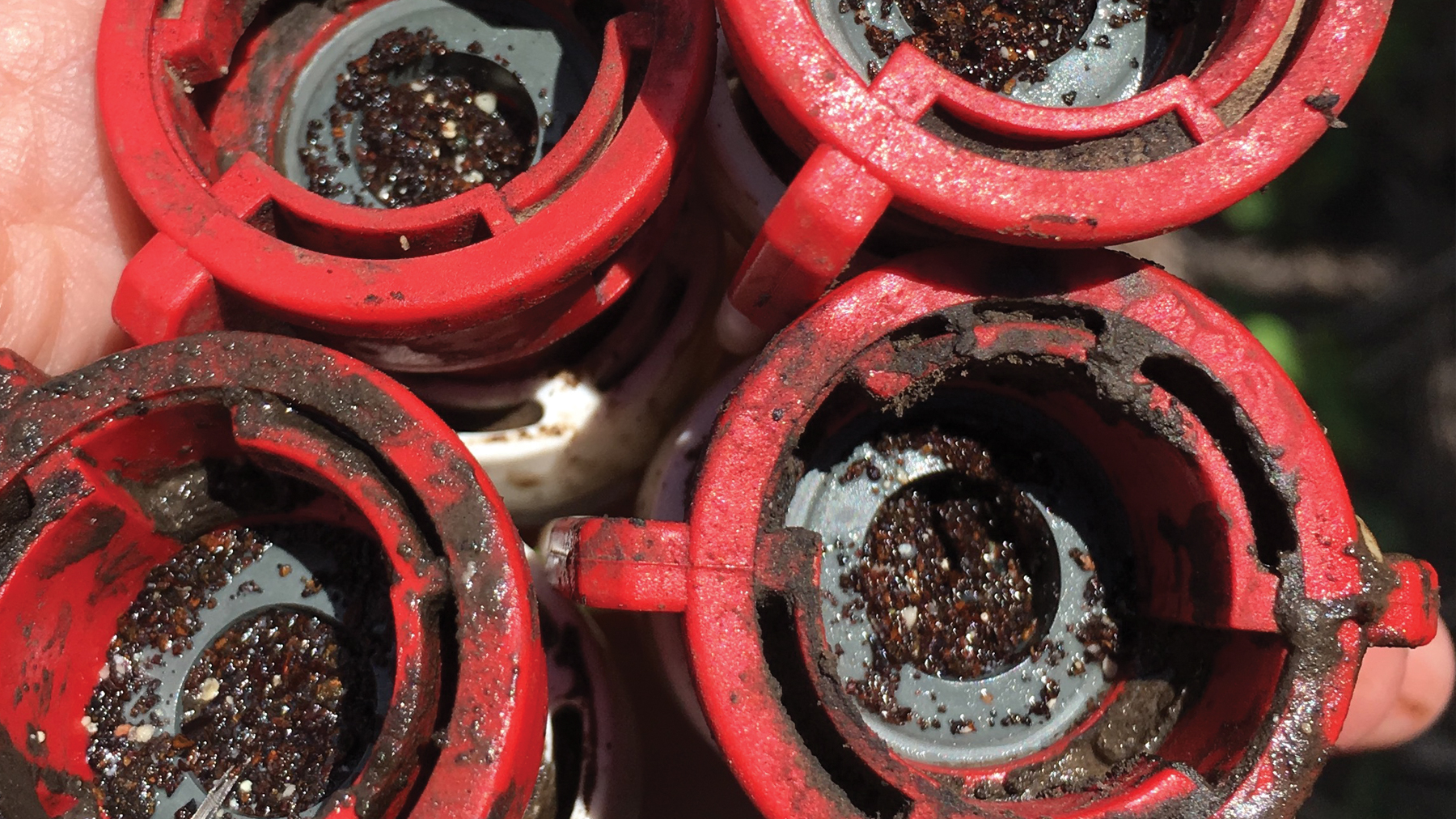  impurities caught in crop sprayer nozzle screens