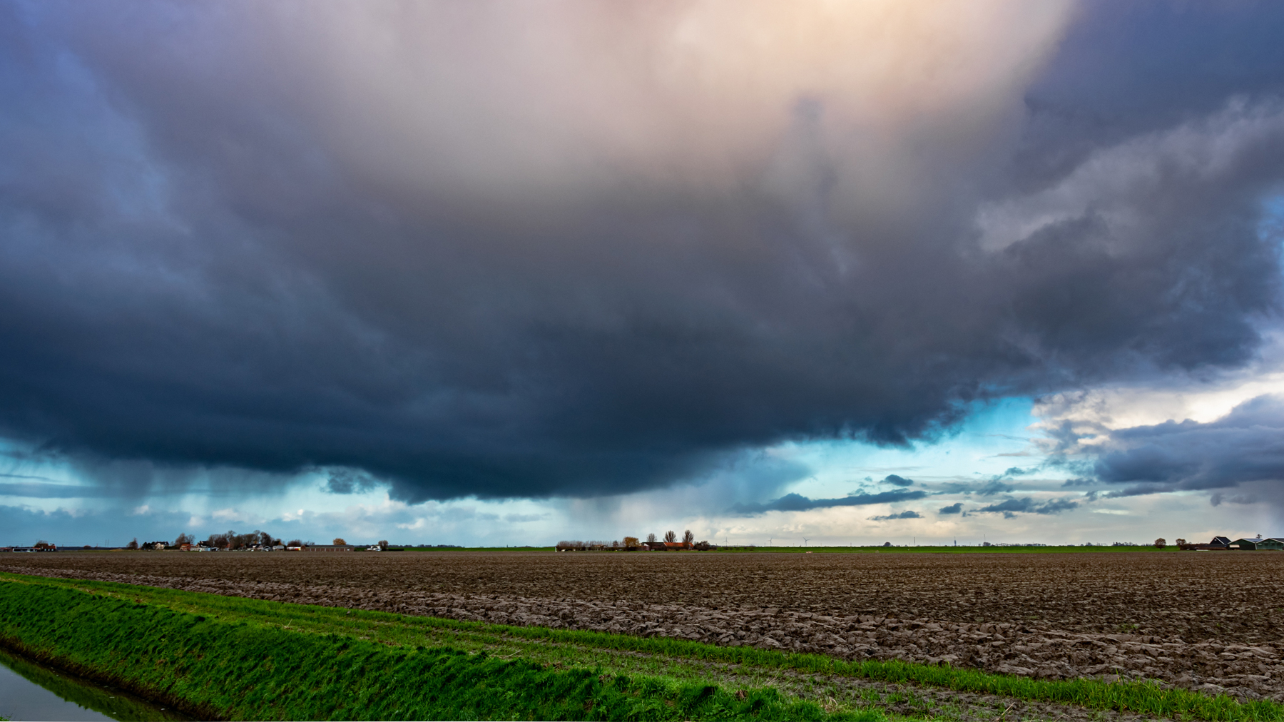 dust cloud over an open field