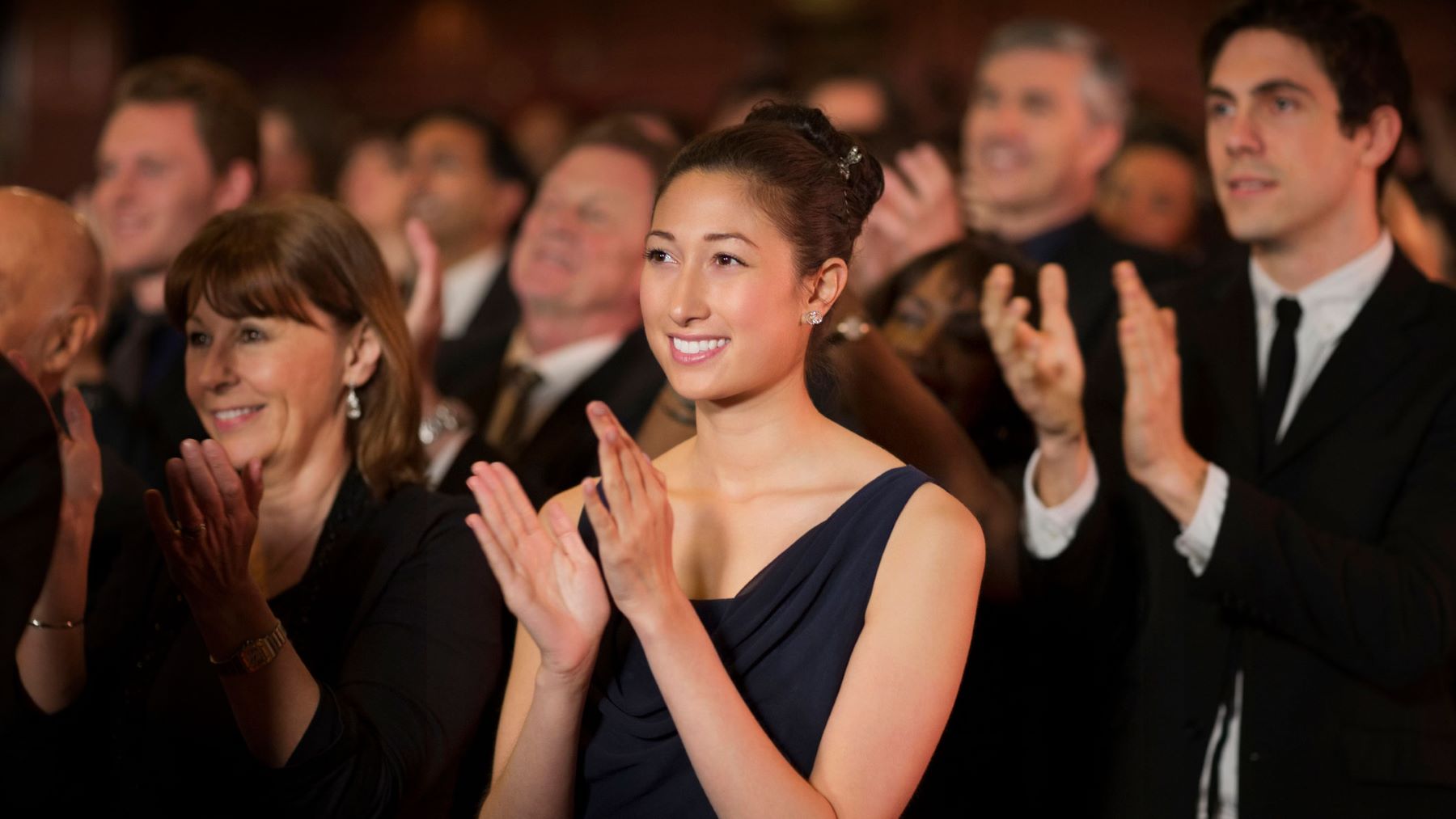 Standing ovation in theatre.