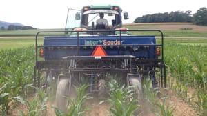 Interseeding tractor in a field Interseeding tractor in a field
