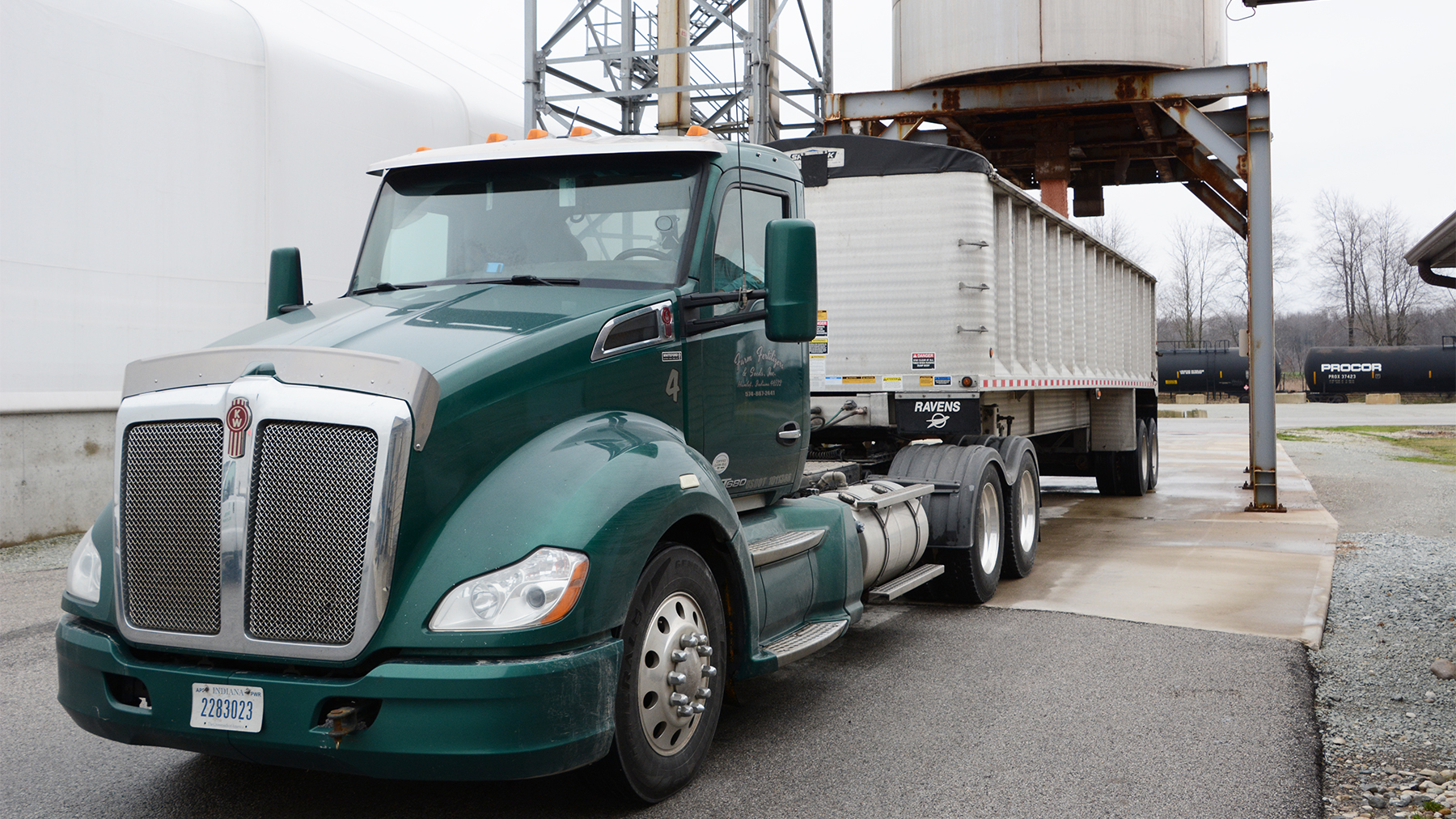 A semitruck near storage bins